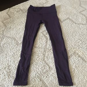 Lululemon discontinued amazing style leggings. Like new.  open weave sides